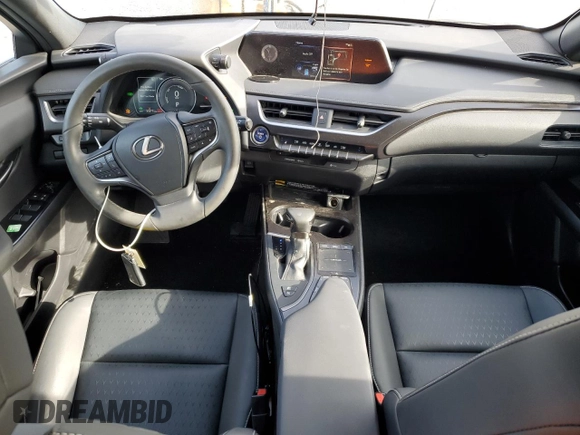 2022 Lexus UX 250h with VIN JTHX9JBH2N2056285, listed as a Copart auction lot 87221214 with 33,377 mi miles and Salvage title. Bid and sale history available at DreamBid. Image 8.
