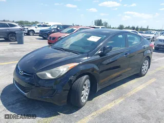 2012 Hyundai Elantra GLS with VIN KMHDH4AE0CU231369, listed as a IAAI auction lot 42067626 with 134,274 mi miles. Bid and sale history available at carsss.com. Image 2.
