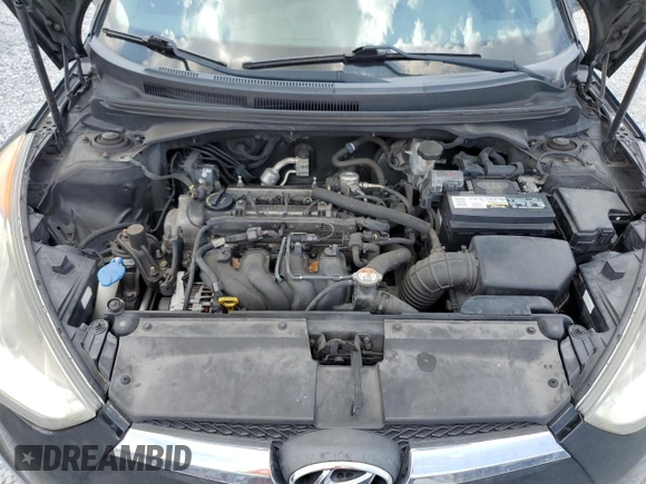 2013 Hyundai Veloster w/Black Int z VIN KMHTC6ADXDU157196, wystawiony jako Copart lot #58091015 z przebiegiem 136 201 mil mil oraz Szkoda całkowita • Salvage title. Historia ofert i sprzedaży dostępna na DreamBid. Obrazek 11.