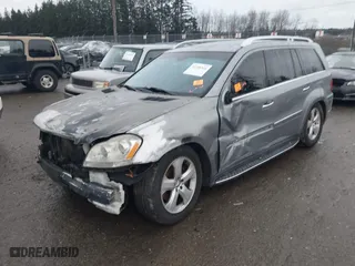 2010 Mercedes-Benz GL-Class GL 450 with VIN 4JGBF7BE5AA587487, listed as a IAAI auction lot 41208541 with 1 mi miles. Bid and sale history available at carsss.com. Image 2.