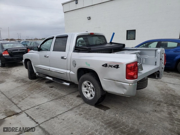2006 Dodge Dakota Laramie with VIN 1D7HW58N26S644035, listed as a Copart auction lot 86539974 with 161,577 mi miles and Salvage Title. Bid and sale history available at carsss.com. Image 2.
