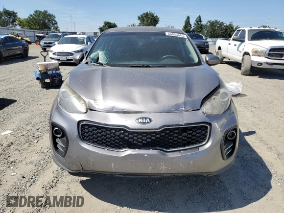2017 Kia Sportage LX z VIN KNDPMCAC9H7159793, wystawiony jako Copart lot #56603345 z przebiegiem 157 860 mil mil oraz Szkoda całkowita • Salvage title. Historia ofert i sprzedaży dostępna na DreamBid. Obrazek 5.