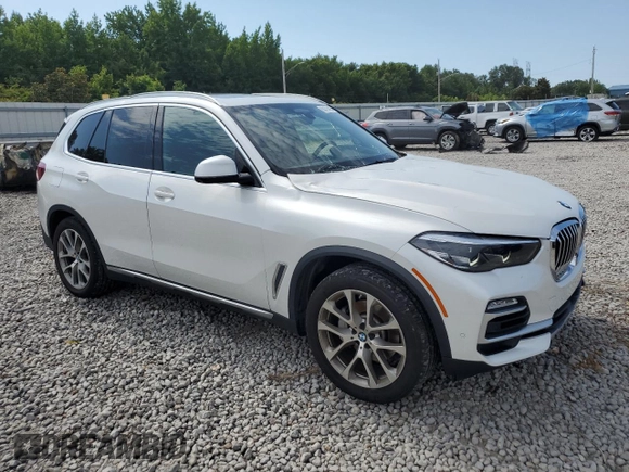 2019 BMW X5 xDrive40i with VIN 5UXCR6C5XKLK80703, listed as a Copart auction lot 63473495 with 57,260 mi miles and Salvage title. Bid and sale history available at DreamBid. Image 4.