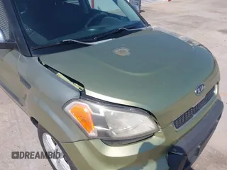 2010 Kia Soul + with VIN KNDJT2A21A7111933, listed as a IAAI auction lot 42025069 with 185,662 mi miles. Bid and sale history available at carsss.com. Image 6.