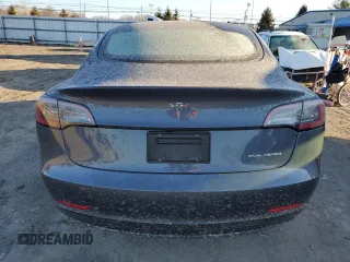 2023 Tesla Model 3 Long Range with VIN 5YJ3E1EB3PF703943, listed as a Copart auction lot 46411505 with Not Provided miles and Salvage Title. Bid and sale history available at DreamBid. Image 6.