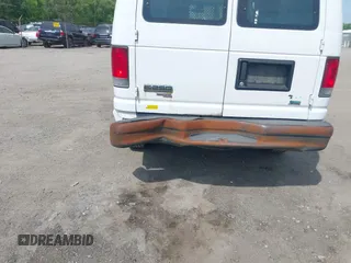 2014 Ford Econoline Cargo Commercial with VIN 1FTNE2EL6EDA22641, listed as a IAAI auction lot 42156425 with 233,745 mi miles. Bid and sale history available at carsss.com. Image 6.
