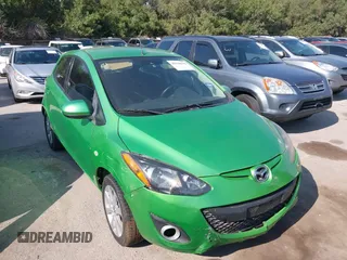 2013 Mazda 2 Touring z VIN JM1DE1LY4D0160351, wystawiony jako IAAI lot #40528604 z przebiegiem 126 911 mil mil oraz . Historia ofert i sprzedaży dostępna na DreamBid. Obrazek 1.