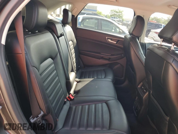 2020 Ford Edge SEL с VIN 2FMPK3J97LBB58552, выставлен на аукционе Copart как лот 58472995 с пробегом 71 387 миль миль и Списание • Salvage title. История ставок и продаж доступна на DreamBid. Изображение 11.