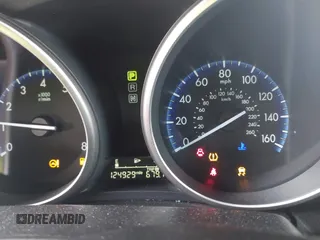 2012 Mazda Mazda3 i Touring with VIN JM1BL1V82C1611229, listed as a IAAI auction lot 41809234 with 124,929 mi miles. Bid and sale history available at carsss.com. Image 7.