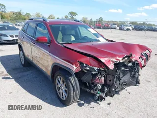 2015 Jeep Cherokee Latitude with VIN 1C4PJLCB0FW643402, listed as a IAAI auction lot 41811328 with 110,232 mi miles and . Bid and sale history available at DreamBid. Image 1.