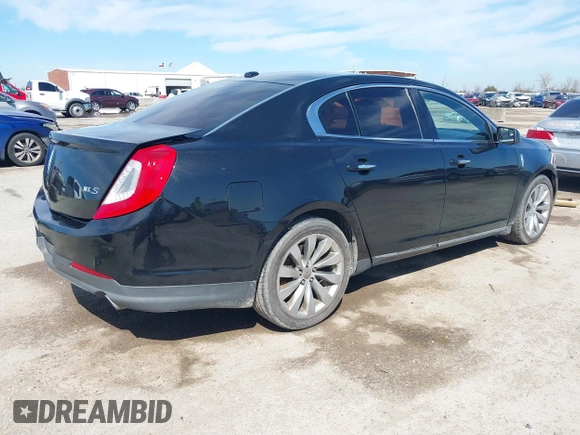 2014 Lincoln MKS with VIN 1LNHL9DK1EG604323, listed as a IAAI auction lot 41635817 with 223,136 mi miles. Bid and sale history available at carsss.com. Image 4.