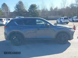 2021 Mazda CX-5 Touring with VIN JM3KFBCM0M0489644, listed as a IAAI auction lot 41756117 with 67,365 mi miles. Bid and sale history available at carsss.com. Image 13.