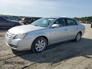 2005 Toyota Avalon XL z VIN 4T1BK36B15U007564, wystawiony jako Copart lot #61904785 z przebiegiem 86 774 mil mil oraz Czysty tytuł • Clean title. Historia ofert i sprzedaży dostępna na DreamBid. Obrazek 1.