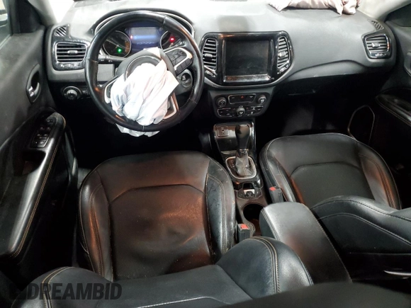 2020 Jeep Compass Limited with VIN 3C4NJCCB2LT169140, listed as a Copart auction lot 58001495 with 97,379 mi miles and Salvage title. Bid and sale history available at DreamBid. Image 8.