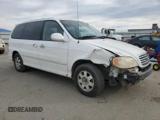 2002 Kia Sedona LX with VIN KNDUP131326271237, listed as a Copart auction lot 89358515 with 142,150 mi miles and Salvage Title. Bid and sale history available at carsss.com. Image 4.