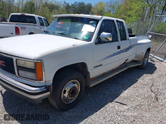 1991 GMC Sierra 1500 with VIN 2GTHC39N2M1512024, listed as a IAAI auction lot 42133143 with 216,701 mi miles and . Bid and sale history available at DreamBid. Image 2.