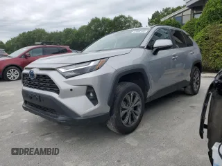 2022 Toyota RAV4 Hybrid XLE Premium with VIN 2T3B6RFV5NW034498, listed as a Copart auction lot 62395105 with 10,590 mi miles and Clean title. Bid and sale history available at DreamBid. Image 1.