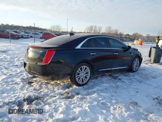 2018 Cadillac XTS Luxury with VIN 2G61M5S30J9132540, listed as a IAAI auction lot 41348925 with 90,921 mi miles and . Bid and sale history available at DreamBid. Image 4.