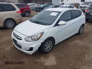 2012 Hyundai Accent GS with VIN KMHCT5AE9CU003502, listed as a IAAI auction lot 41958632 with 187,577 mi miles. Bid and sale history available at carsss.com. Image 2.