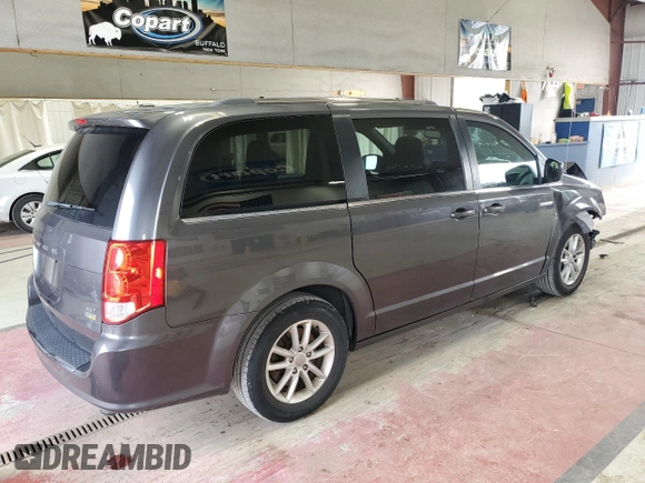 2018 Dodge Grand Caravan SXT z VIN 2C4RDGCG0JR297436, wystawiony jako Copart lot #60523225 z przebiegiem 101 292 mil mil oraz Szkoda całkowita • Salvage title. Historia ofert i sprzedaży dostępna na DreamBid. Obrazek 3.