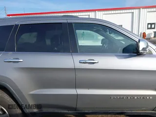 2016 Jeep Grand Cherokee Limited 75th Anniversary with VIN 1C4RJFBG5GC401277, listed as a IAAI auction lot 41119644 with 156,658 mi miles and . Bid and sale history available at DreamBid. Image 14.