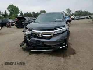 2019 Honda Pilot Elite with VIN 5FNYF6H01KB008279, listed as a Copart auction lot 60553065 with 132,711 mi miles and Salvage title. Bid and sale history available at DreamBid. Image 14.