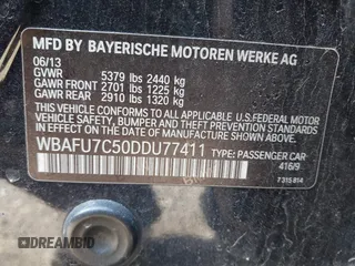2013 BMW 5 Series 535i xDrive with VIN WBAFU7C50DDU77411, listed as a IAAI auction lot 41796299 with 138,944 mi miles and . Bid and sale history available at carsss.com. Image 9.