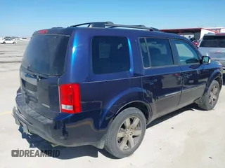 2013 Honda Pilot Touring with VIN 5FNYF3H94DB018384, listed as a IAAI auction lot 41672767 with 188,922 mi miles and . Bid and sale history available at DreamBid. Image 4.