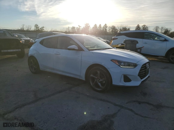 2019 Hyundai Veloster 2.0 with VIN KMHTG6AF6KU019982, listed as a Copart auction lot 88219405 with 56,849 mi miles and Salvage Title. Bid and sale history available at carsss.com. Image 4.