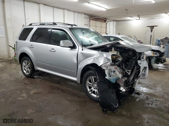 2010 Mercury Mariner Premier with VIN 4M2CN8HG4AKJ10385, listed as a Copart auction lot 70435004 with 133,615 mi miles and Salvage Title. Bid and sale history available at carsss.com. Image 4.