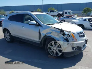 2011 Cadillac SRX Premium Collection z VIN 3GYFNFEYXBS599279, wystawiony jako IAAI lot #42372367 z przebiegiem 97 888 mil mil oraz . Historia ofert i sprzedaży dostępna na DreamBid. Obrazek 1.