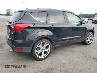2019 Ford Escape Titanium with VIN 1FMCU0J95KUB14713, listed as a Copart auction lot 55887895 with 85,414 mi miles and Salvage title. Bid and sale history available at DreamBid. Image 3.
