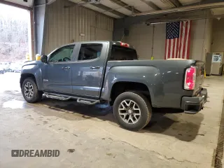 2015 GMC Canyon 4WD SLE with VIN 1GTG6BE37F1118335, listed as a Copart auction lot 85271264 with 58,679 mi miles and Salvage Title. Bid and sale history available at carsss.com. Image 2.
