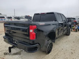 2022 Chevrolet Silverado 1500 LT Trail Boss with VIN 3GCUDFET5NG654765, listed as a Copart auction lot 82947694 with 77,747 mi miles and Salvage Title. Bid and sale history available at DreamBid. Image 3.