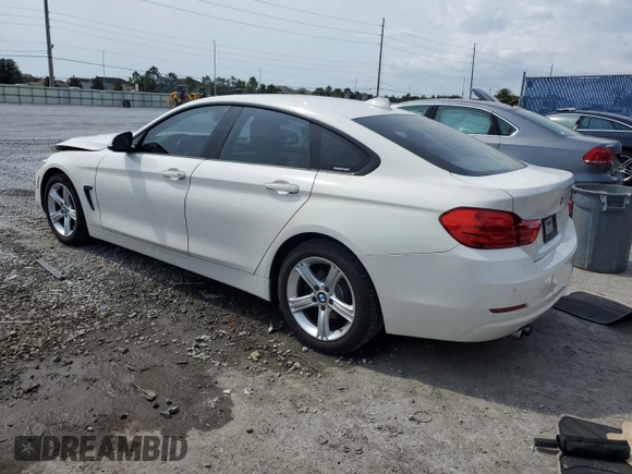 2015 BMW 4 Series 428i with VIN WBA4A9C59FGL85999, listed as a Copart auction lot 56275455 with 105,961 mi miles and Salvage title. Bid and sale history available at DreamBid. Image 2.