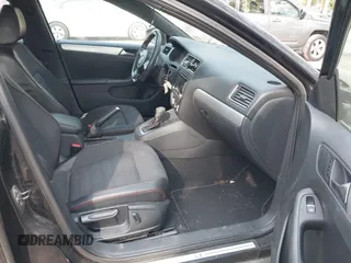 2013 Volkswagen Jetta GLI Autobahn with VIN 3VW467AJ2DM215802, listed as a IAAI auction lot 42077962 with 102,339 mi miles and . Bid and sale history available at DreamBid. Image 5.