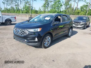 2022 Ford Edge Titanium with VIN 2FMPK4K99NBA45354, listed as a IAAI auction lot 42187761 with 75,458 mi miles and . Bid and sale history available at DreamBid. Image 2.