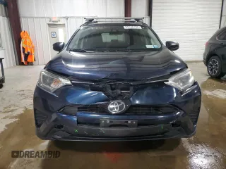 2017 Toyota RAV4 LE with VIN JTMBFREV0HJ174267, listed as a Copart auction lot 59146155 with 116,032 mi miles and Salvage title. Bid and sale history available at DreamBid. Image 5.