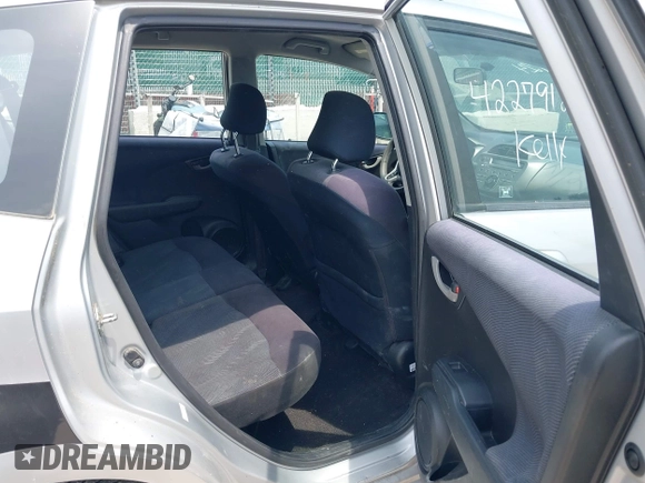 2011 Honda Fit Sport with VIN JHMGE8H51BS005356, listed as a IAAI auction lot 42279124 with 285,524 mi miles and . Bid and sale history available at DreamBid. Image 8.