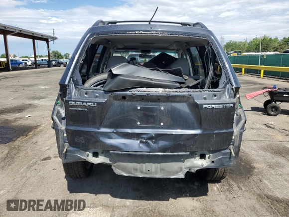 2012 Subaru Forester X Premium with VIN JF2SHBDC6CH415672, listed as a Copart auction lot 61815565 with 117,692 mi miles and Salvage title. Bid and sale history available at DreamBid. Image 6.
