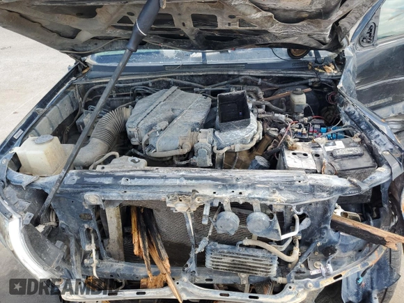 2006 Toyota Tacoma z VIN 3TMLU42N56M007744, wystawiony jako Copart lot #60804295 z przebiegiem 196 715 mil mil oraz Szkoda całkowita • Salvage title. Historia ofert i sprzedaży dostępna na DreamBid. Obrazek 11.