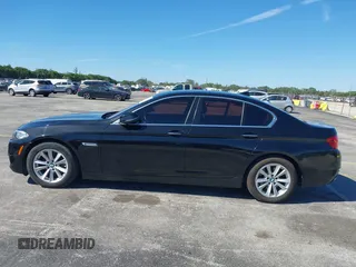 2015 BMW 5 Series 528i xDrive with VIN WBA5A7C58FG144069, listed as a IAAI auction lot 41854112 with 136,403 mi miles and . Bid and sale history available at DreamBid. Image 14.