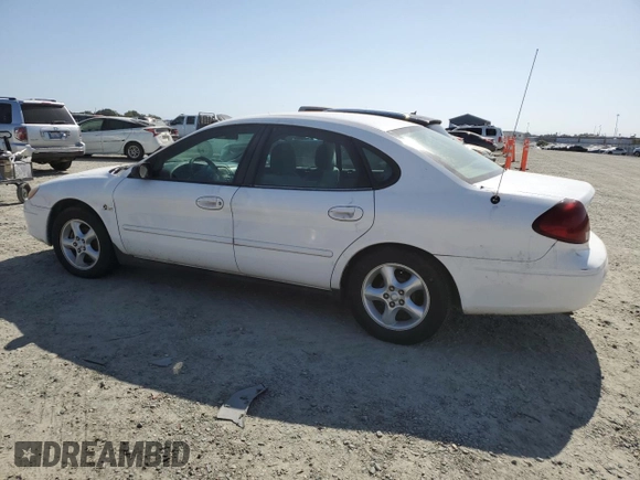 2000 Ford Taurus LX with VIN 1FAFP5222YA168638, listed as a Copart auction lot 60710415 with 119,948 mi miles and Salvage title. Bid and sale history available at DreamBid. Image 2.