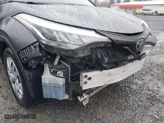 2020 Toyota C-HR LE with VIN JTNKHMBX5L1082286, listed as a IAAI auction lot 41837434 with 57,910 mi miles. Bid and sale history available at carsss.com. Image 6.