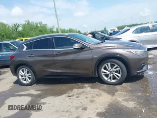 2019 Infiniti QX30 Luxe z VIN SJKCH5CP5KA012022, wystawiony jako IAAI lot #42088799 z przebiegiem 107 381 mil mil oraz . Historia ofert i sprzedaży dostępna na DreamBid. Obrazek 13.