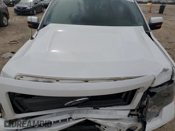 2014 Ford F-150 XL z VIN 1FTFW1EF5EKE07142, wystawiony jako Copart lot #56001905 z przebiegiem 128 334 mil mil oraz Szkoda całkowita • Salvage title. Historia ofert i sprzedaży dostępna na DreamBid. Obrazek 11.