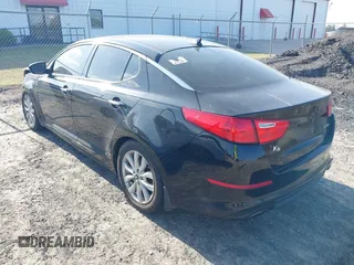 2014 Kia Optima EX with VIN 5XXGN4A70EG277871, listed as a IAAI auction lot 42183248 with 128,300 mi miles and . Bid and sale history available at carsss.com. Image 3.