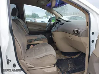 2007 Nissan Quest SL with VIN 5N1BV28U87N106556, listed as a IAAI auction lot 42121368 with 203,693 mi miles. Bid and sale history available at carsss.com. Image 5.