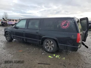 1996 Chevrolet Suburban with VIN 3GNEC16R9TG167845, listed as a Copart auction lot 80119734 with 414,794 mi miles and Salvage title. Bid and sale history available at DreamBid. Image 2.