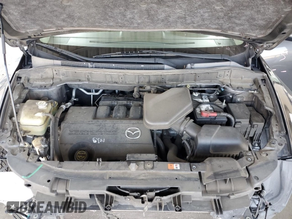 2015 Mazda CX-9 Grand Touring z VIN JM3TB3DV2F0456130, wystawiony jako Copart lot #55787935 z przebiegiem 120 888 mil mil oraz Szkoda całkowita • Salvage title. Historia ofert i sprzedaży dostępna na DreamBid. Obrazek 11.